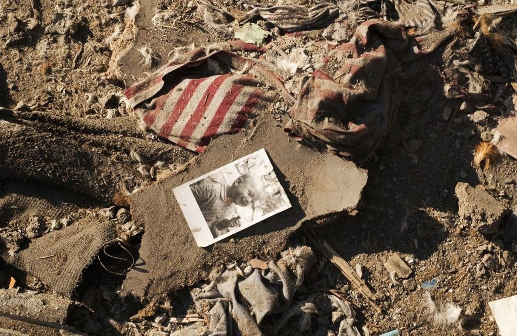 Photo from the family album of a man whose relatives died under the rubble of the five-story building, Mykolaiv